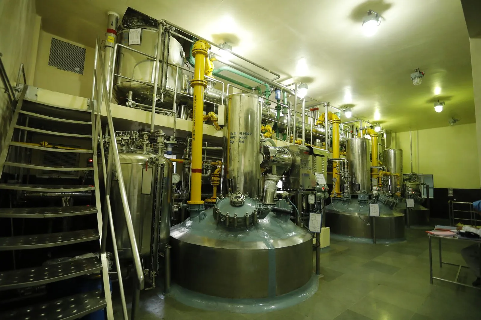 Process vessels in a production hall at the Exemed plant